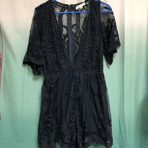 Super cute, navy blue lace romper